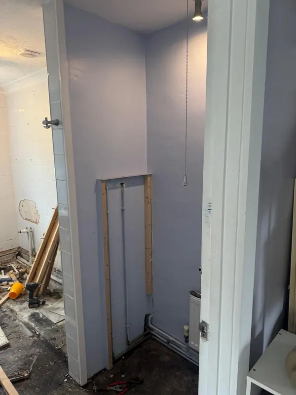 Bathroom stripped back to the walls and floor