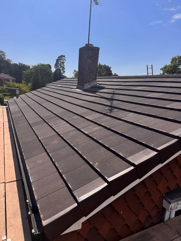 Finished roof with new tiles and chimney